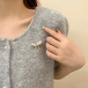 Wholesale Women's Alloy Flower Pattern Irregular Bow Electroplated Brooch