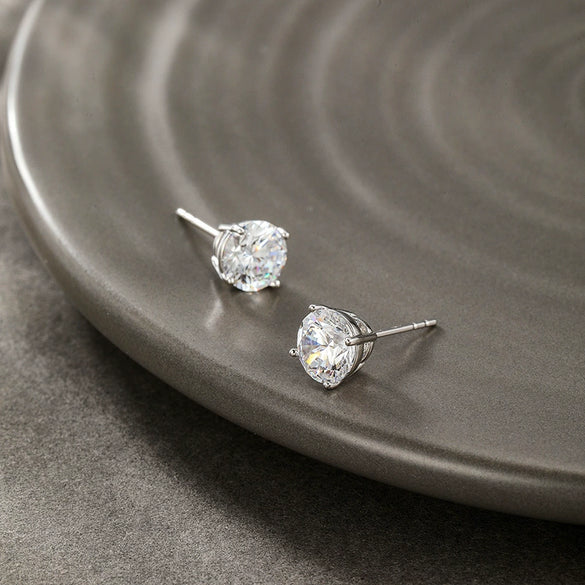 Wholesale Women's Alloy Fourclaw Single Zircon Geometric Earrings With Electroplating