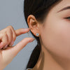 Wholesale Women's Alloy Fourclaw Single Zircon Geometric Earrings With Electroplating