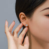 Wholesale Women's Alloy Fourclaw Single Zircon Geometric Earrings With Electroplating