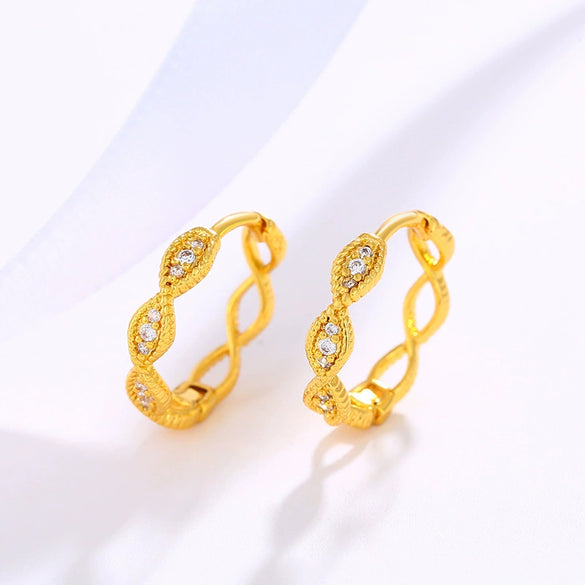 Wholesale Women's Alloy Geometric Cross Wavy Electroplated Earrings