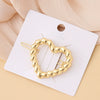 Wholesale Women's Alloy Geometric Electroplated Golden Frog Clip Jewelry