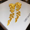 Wholesale Women's Alloy Geometric Flowerpatterned Electroplated Earrings