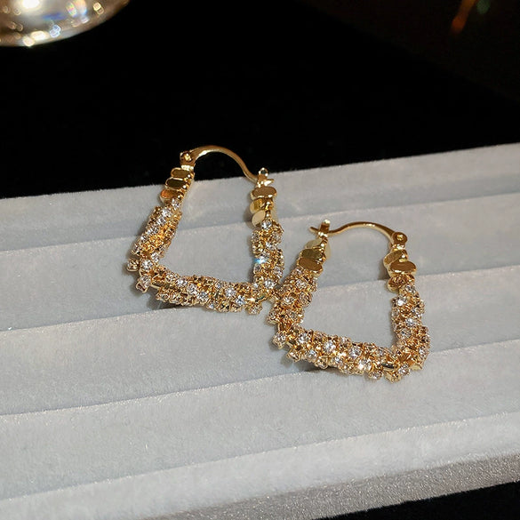 Wholesale Women's Alloy Geometric Flowerpatterned Electroplated Earrings