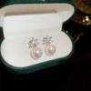 Wholesale Women's Alloy Geometric Flowerpatterned Electroplated Earrings