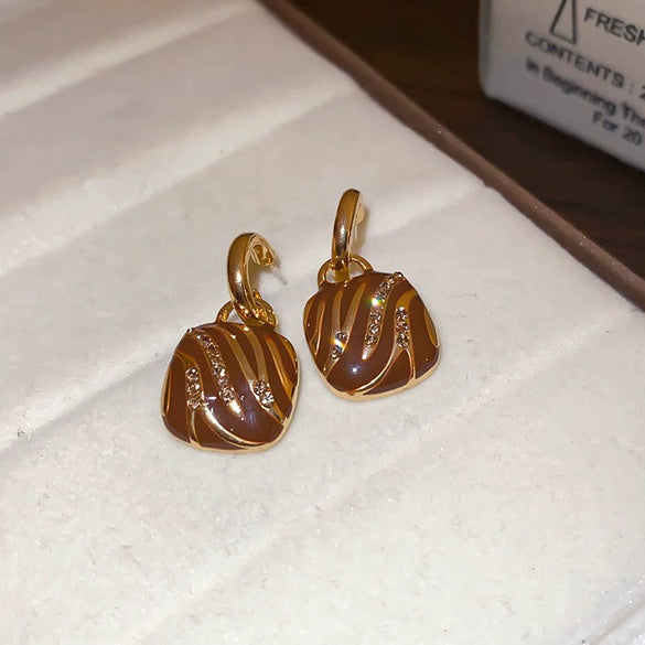 Wholesale Women's Alloy Geometric Maillard Style Earrings With Silver Needle And Electroplating