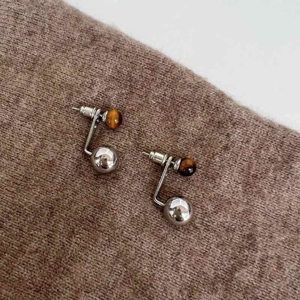 Wholesale Women's Alloy Geometric Maillard Style Earrings With Silver Needle And Electroplating