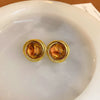 Wholesale Women's Alloy Geometric Maillard Style Earrings With Silver Needle And Electroplating