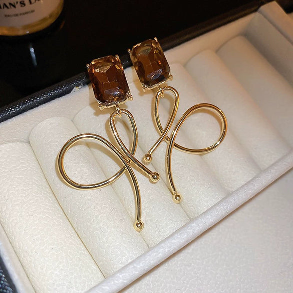 Wholesale Women's Alloy Geometric Maillard Style Earrings With Silver Needle And Electroplating