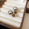 Wholesale Women's Alloy Geometric Maillard Style Earrings With Silver Needle And Electroplating
