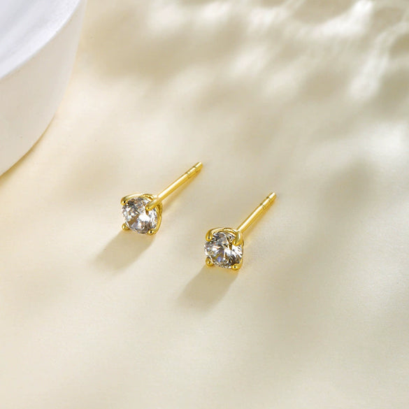 Wholesale Women's Alloy Geometric Minimalist Fourclaw Single Zircon Electroplated Earrings