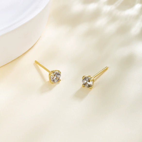 Wholesale Women's Alloy Geometric Minimalist Fourclaw Single Zircon Electroplated Earrings