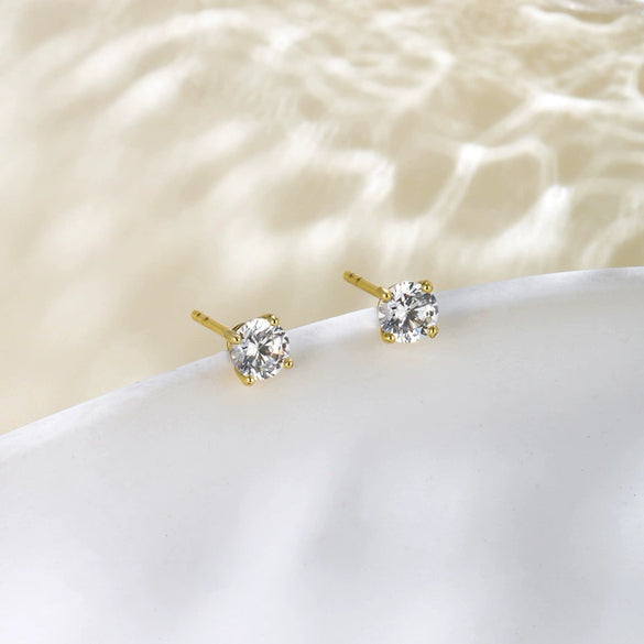 Wholesale Women's Alloy Geometric Minimalist Fourclaw Single Zircon Electroplated Earrings