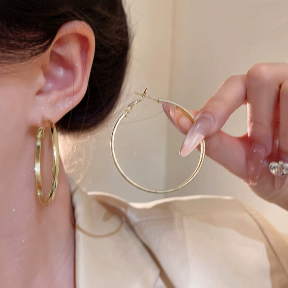 Wholesale Women's Alloy Geometric Round Plain Hoop Earrings With Electroplating