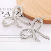 Wholesale Women's Alloy Hair Accessories With Starfish Shell Bear Bow Tie Geometric Patterns And Electroplating