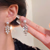 Wholesale Women's Alloy Light Luxury Retro Niche Personality Electroplated Zircon Wheat Tassel And Pearl Earrings With Leaf Pattern