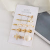 Wholesale Women's Alloy Pearl Shell Hair Accessories Ocean Series Simple Style Electroplated Hairpins