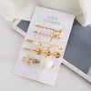 Wholesale Women's Alloy Pearl Shell Hair Accessories Ocean Series Simple Style Electroplated Hairpins