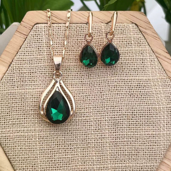 Wholesale Women's Alloy Water Drops Pattern Electroplated Pearl Chain Clavicle Chain And Earrings Three Piece Set
