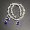 Wholesale Women's Alloy Water Drops Pattern Electroplated Pearl Chain Clavicle Chain And Earrings Three Piece Set