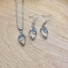 Wholesale Women's Alloy Water Drops Pattern Electroplated Pearl Chain Clavicle Chain And Earrings Three Piece Set