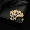 Wholesale Women's And Unisex Zinc Alloy Leaf Shape Cat's Eye Stone Inlay Brooch Simple Style
