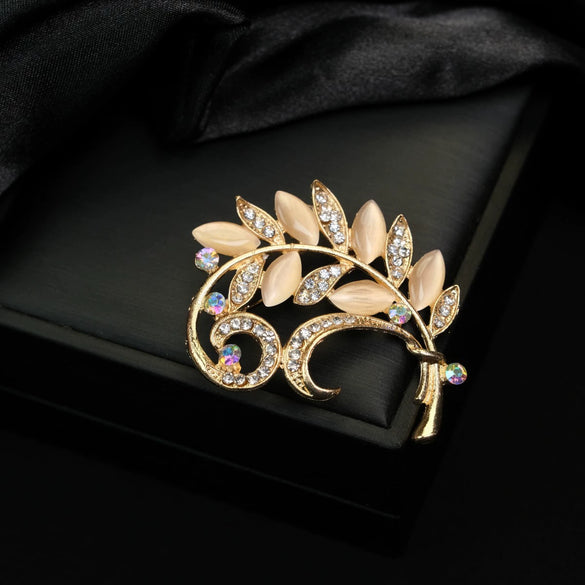 Wholesale Women's And Unisex Zinc Alloy Leaf Shape Cat's Eye Stone Inlay Brooch Simple Style