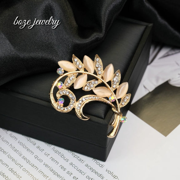 Wholesale Women's And Unisex Zinc Alloy Leaf Shape Cat's Eye Stone Inlay Brooch Simple Style