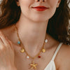 Wholesale Women's Animal Style Stainless Steel Cross Chain Necklace With Ocean Themed Starfish And Shell Pendant Vacuum Real Gold Plated