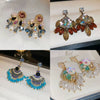 Wholesale Women's Artificial Crystal Butterfly Earrings With Real Gold Electroplated Silver Needles And Inlaid Pearls
