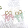 Wholesale Women's Bohemian Style Silk Straw Earrings With Doll Pattern And Ribbon Tassel