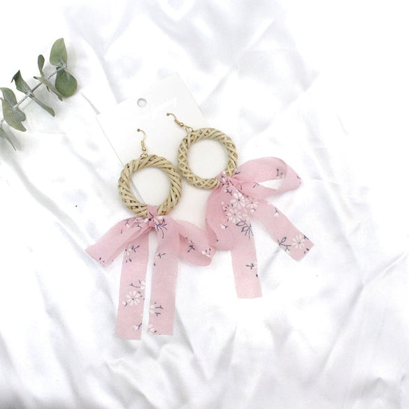 Wholesale Women's Bohemian Style Silk Straw Earrings With Doll Pattern And Ribbon Tassel