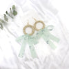 Wholesale Women's Bohemian Style Silk Straw Earrings With Doll Pattern And Ribbon Tassel