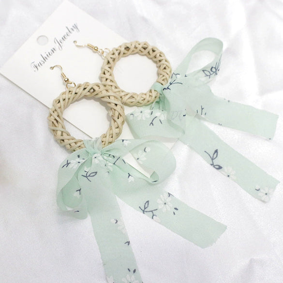 Wholesale Women's Bohemian Style Silk Straw Earrings With Doll Pattern And Ribbon Tassel