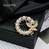 Wholesale Women's Bow Pearl Brooch Zinc Alloy Electroplated Clothing Accessory