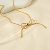 Wholesale Women's Bow Pendant Necklace With Snake Bone Chain In Titanium Steel Electroplated With 18K Gold