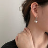 Wholesale Women's Brass Heart Shaped Asymmetric Bear Love Earrings Light Luxury Cold Style
