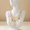 Wholesale Women's Casual Geometric Alloy Electroplated Gold Coin Portrait Pearl Multilayered Necklace
