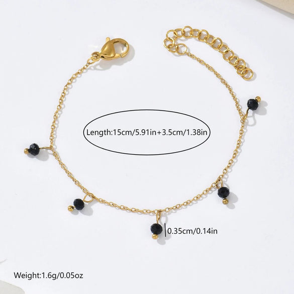 Wholesale Women's Casual Geometric Stainless Steel 14K Electroplated Snake Bone Chain Inlaid With Emeralds And Black Bead Pendant Bracelet Jewelry