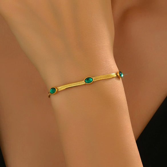 Wholesale Women's Casual Geometric Stainless Steel 14K Electroplated Snake Bone Chain Inlaid With Emeralds And Black Bead Pendant Bracelet Jewelry