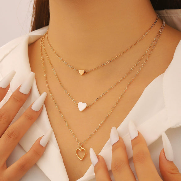 Wholesale Women's Casual Multilayered Necklace Threepiece Set With Electroplated Zinc Alloy Heart Pendant