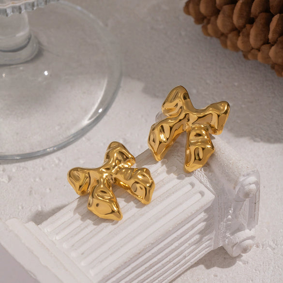 Wholesale Women's Casual Pleated Texture Bow Earrings In Titanium Steel With Vacuum Real Gold Plating