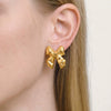 Wholesale Women's Casual Pleated Texture Bow Earrings In Titanium Steel With Vacuum Real Gold Plating