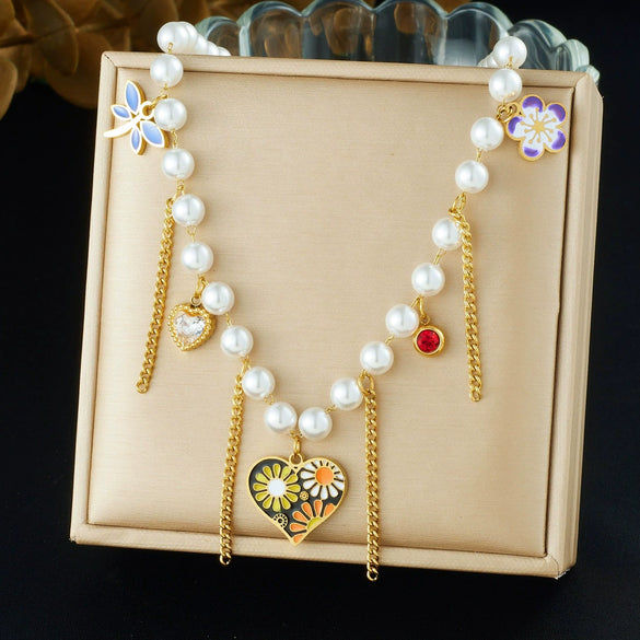 Wholesale Women's Casual Stainless Steel Electroplated Heart Shape Insect Pattern Pearl Strand Beaded Chain Necklace With Imitation Pearl Tassel Pendant