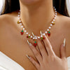 Wholesale Women's Casual Style Fruit Shaped Alloy Electroplated Fake Pearl Necklace