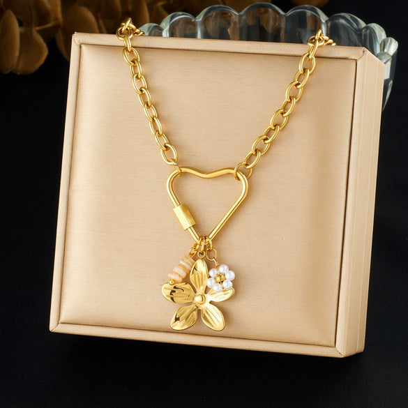 Wholesale Women's Casual Style Goldplated Stainless Steel Heartshaped Flower Pattern Pendant Necklace With Flat Cross Chain