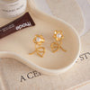 Wholesale Women's Casual Style Stainless Steel Electroplated Flower Earrings