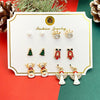 Wholesale Women's Christmas Earrings Alloy Creative Cartoon Elk Snowflake Santa Claus Design With Diamond Treatment