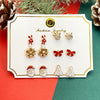 Wholesale Women's Christmas Earrings Alloy Creative Cartoon Elk Snowflake Santa Claus Design With Diamond Treatment