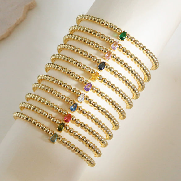 Wholesale Women's Copper Beaded Elastic Wire Bracelet With Drop Shape Zircon And Twelve Birthstone Electroplated
